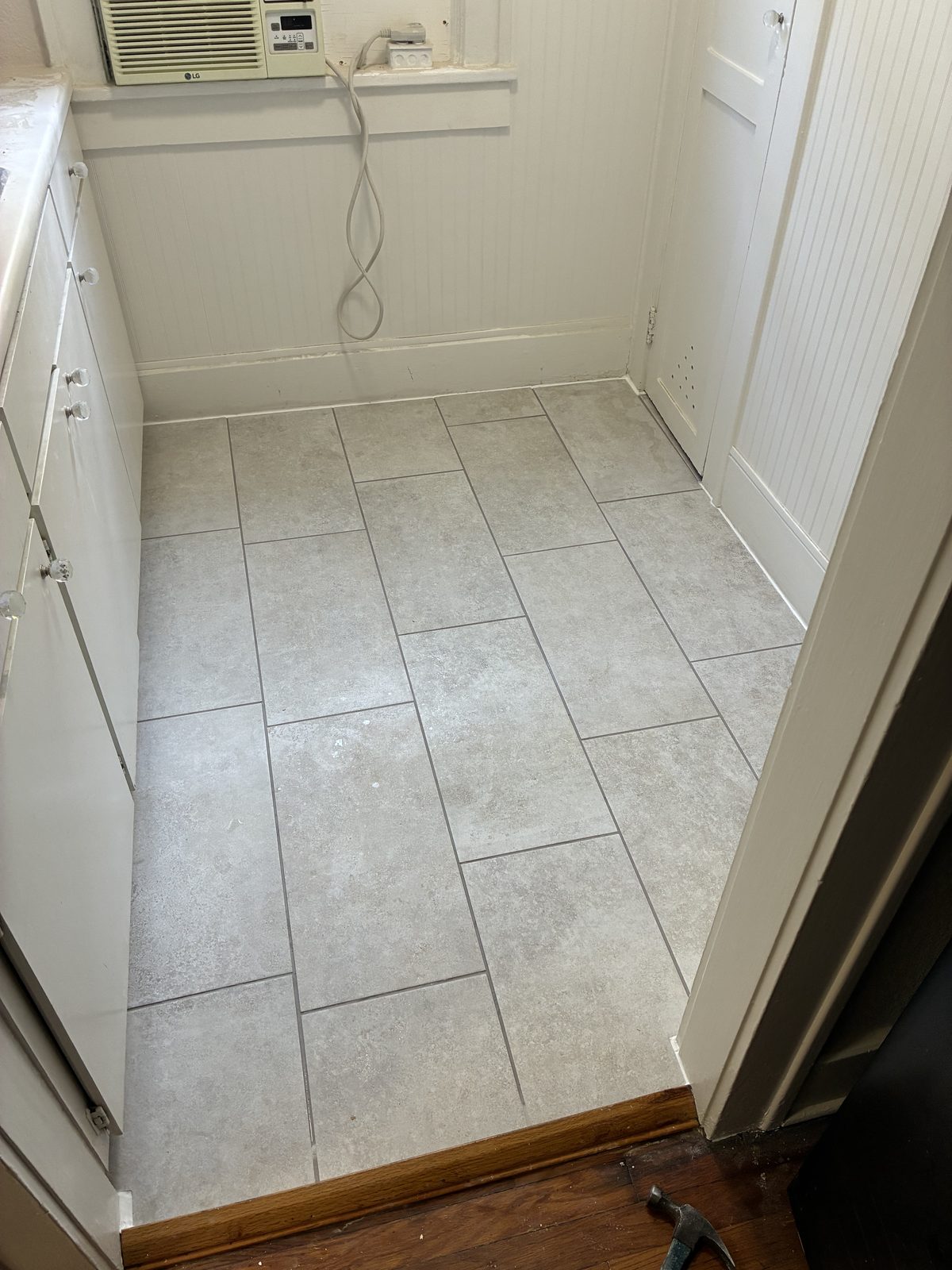 Finished bathroom tile floor