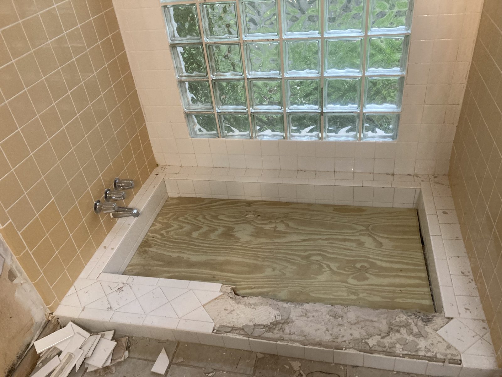 Bathroom remodel demo, glass block window
