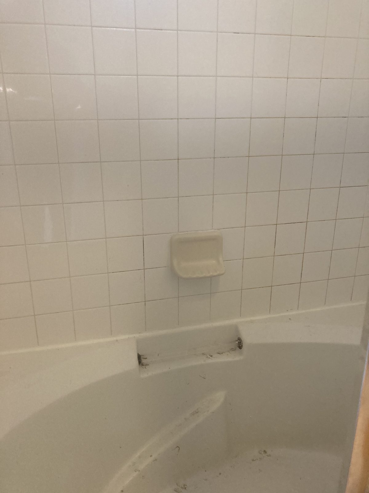 White subway tile tub surround