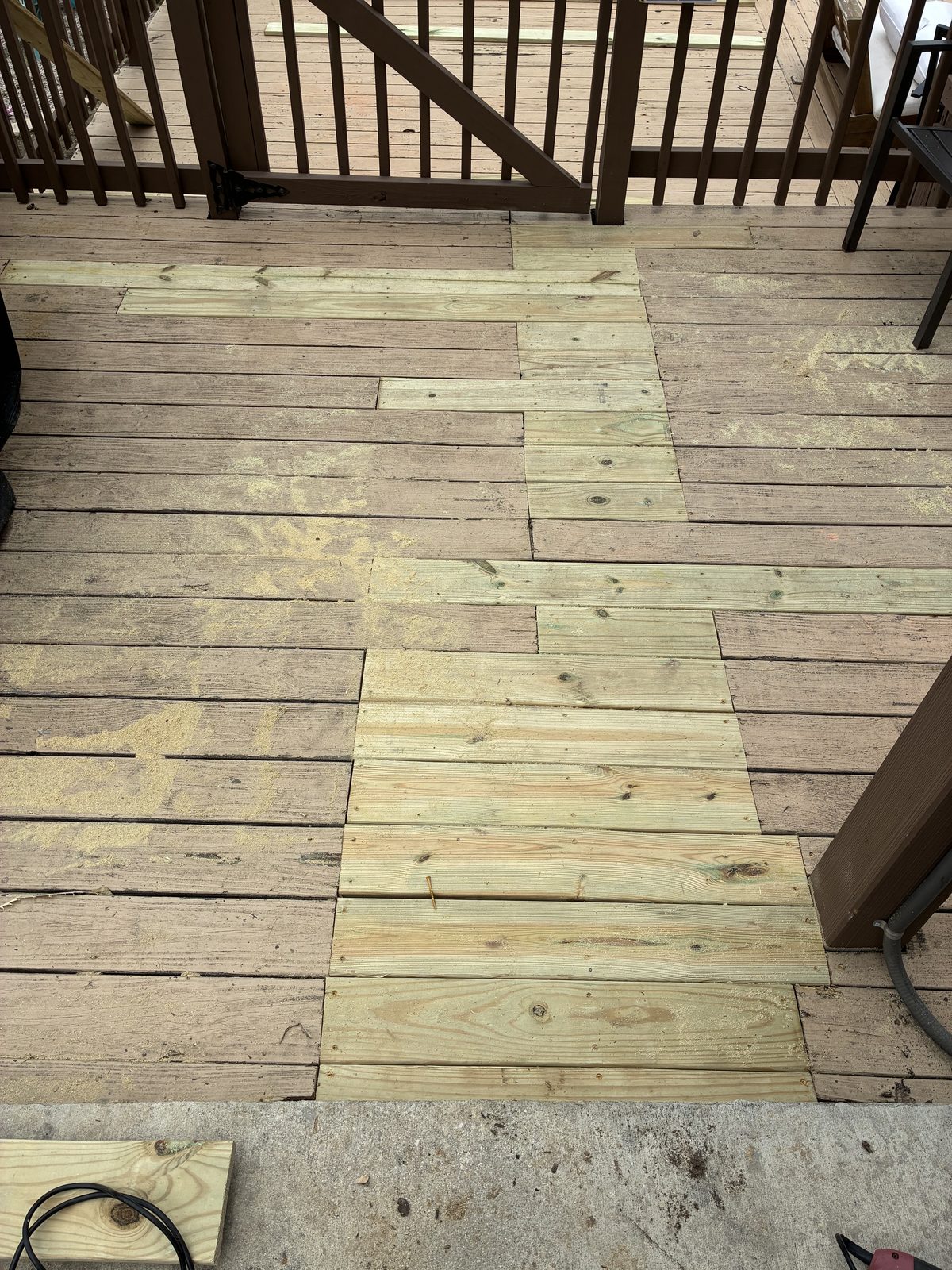 New deck boards installed over pool deck frame