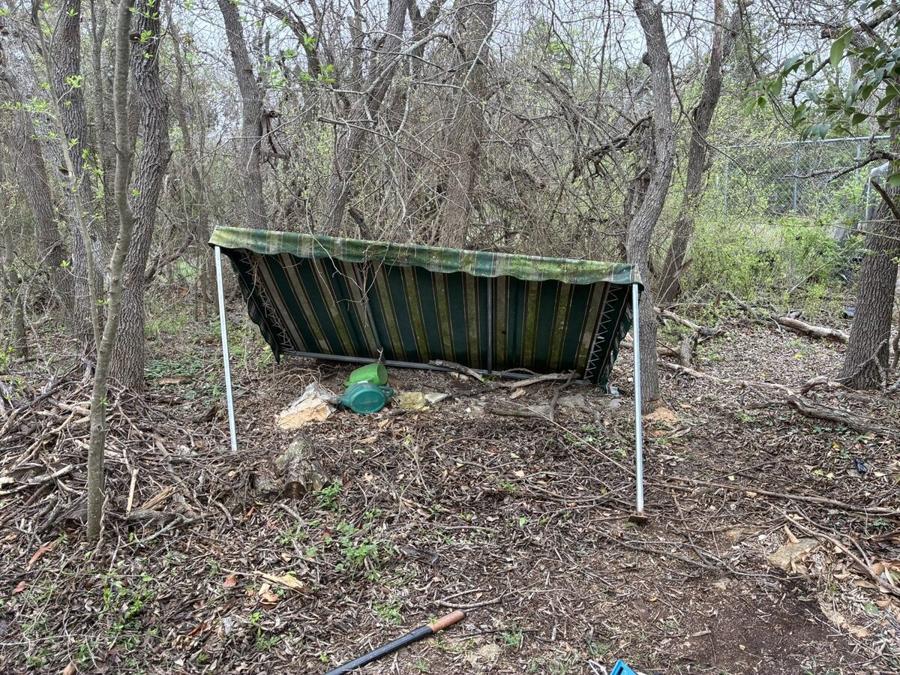Wooded lot before deck build