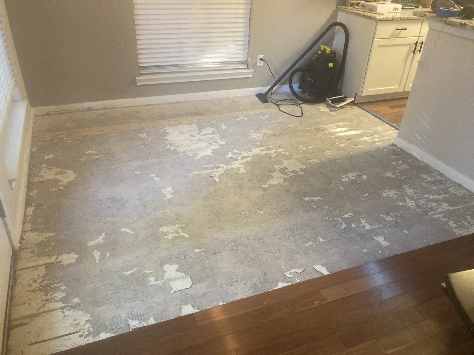Old kitchen flooring removal and prep