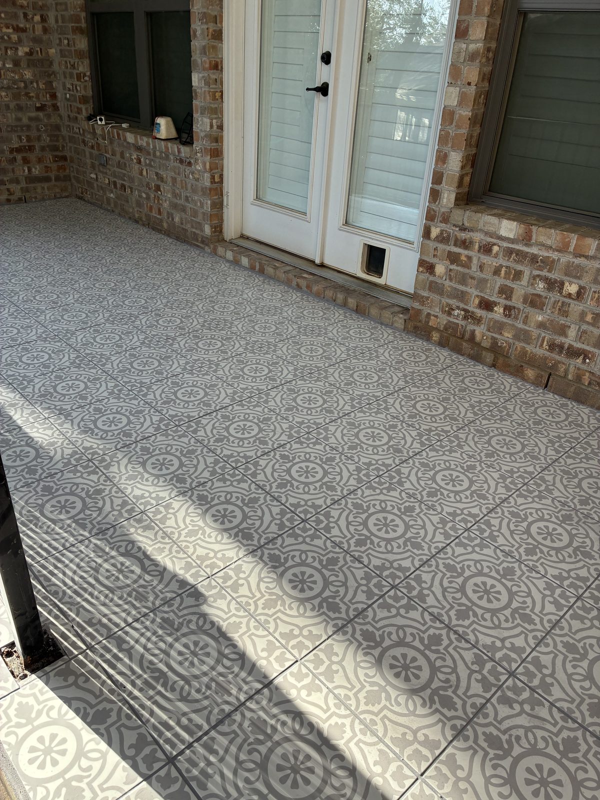 Decorative outdoor patio tile installation Austin