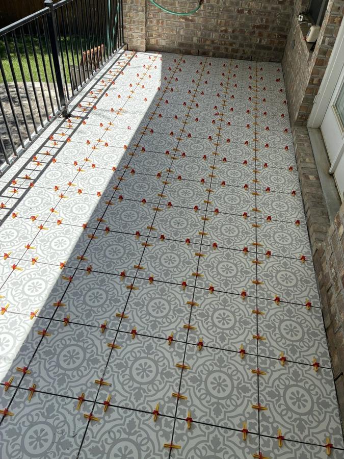 Patio tile installation in progress Austin TX