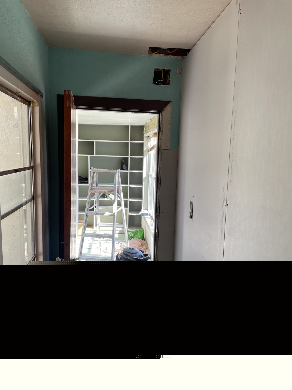 Interior doorway before repair Austin